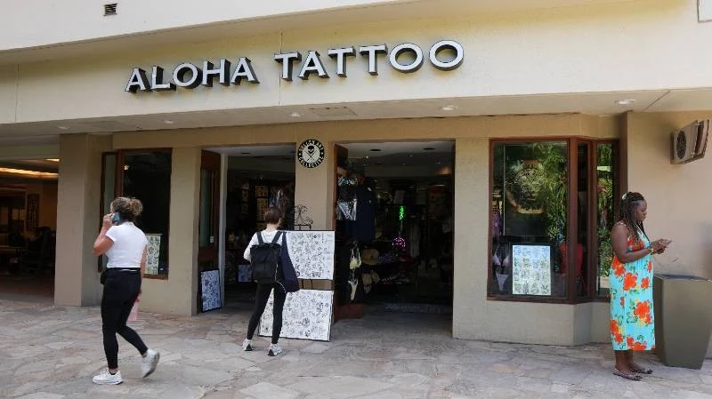 Aloha Tattoo storefront at Hilton Hawaiian Village Diamond Head Tower — Honolulu Hawaii — veteran-owned tattoo studio since 1990, walk-ins welcome
